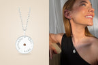 Enduring Real Rare Meaning Pendant – silver pendant and worn by model