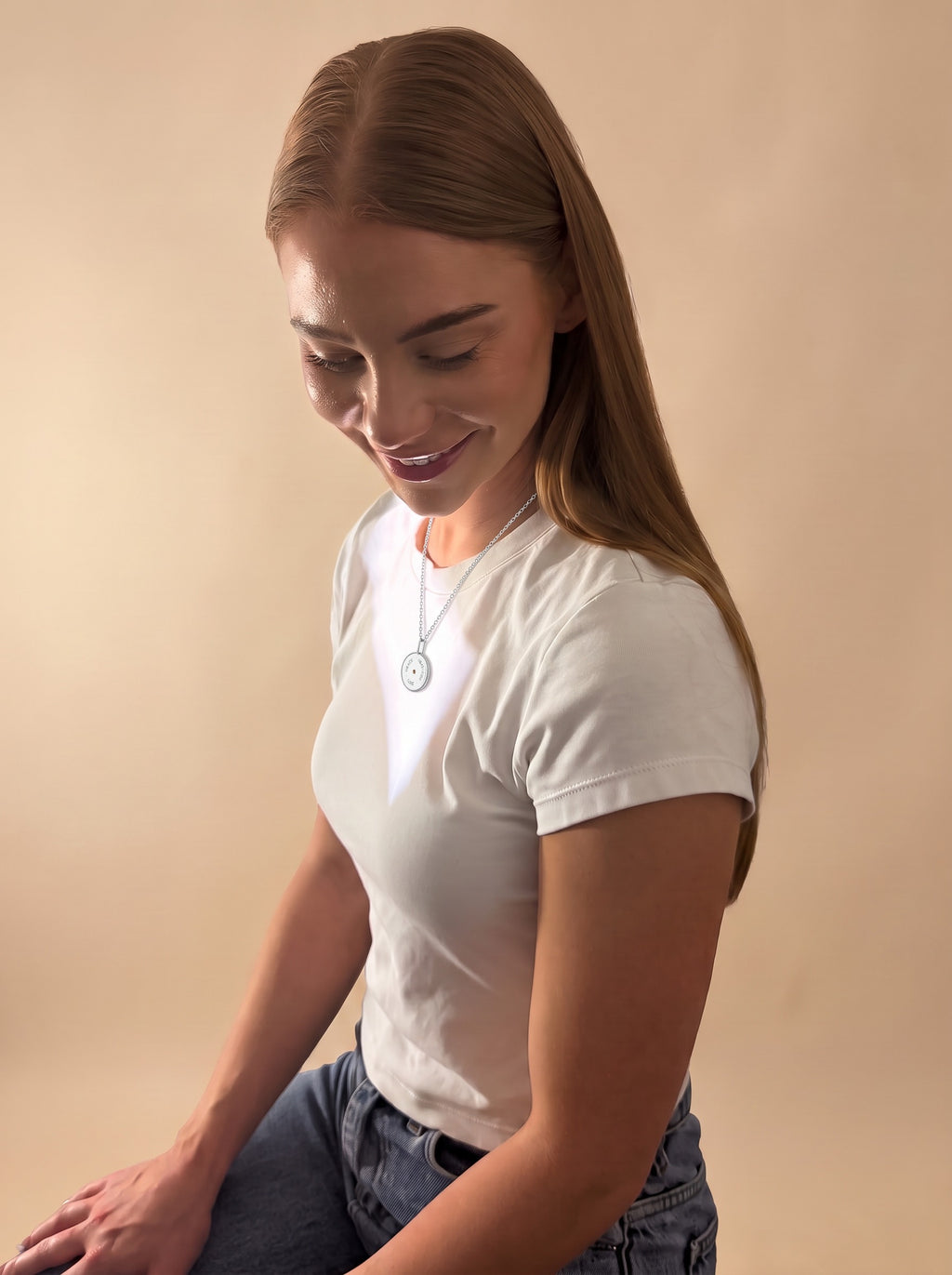 Grace Love Gratitude Meaning Pendant worn with white tee