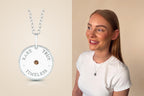 Rare · Timeless · True Meaning Pendant in sterling silver, shown beside the model wearing it